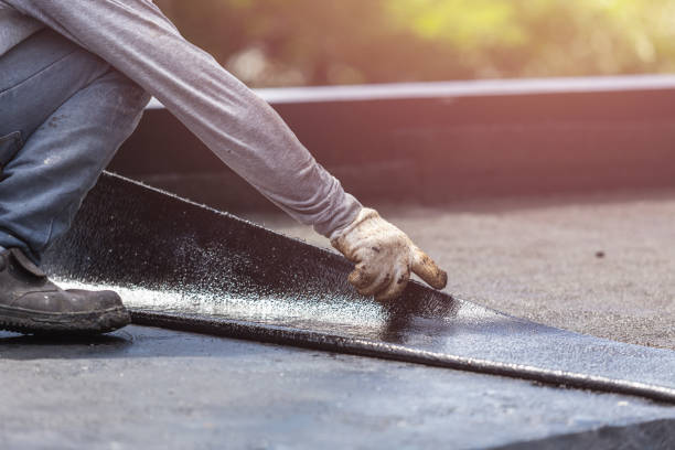 Professional Basement Waterproofing technician working in Troy, AL